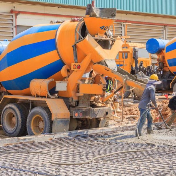 Concrete pouring during commercial concreting floors of buildings on construction site free photo 1024x683 1 600x600